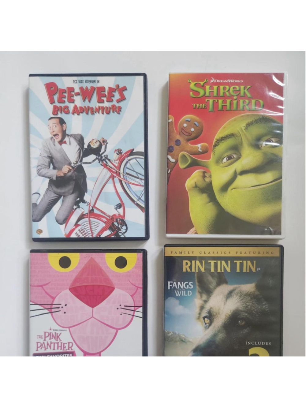 Four DVD Movie Bundle/ Pink Panther, Shrek the Third, Rin Tin Tin, Pee Wees Big